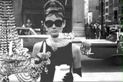 Breakfast At Tiffany's movie poster (Audrey Hepburn in window)